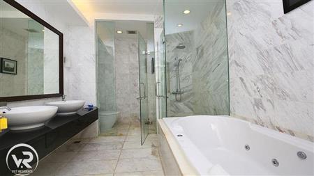 Master bathroom with both shower & bath tub