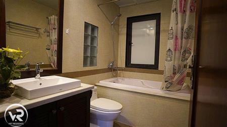 Master bathroom with bathtub